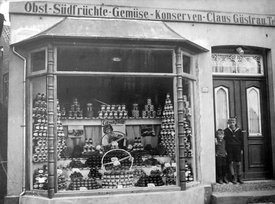 1928 Claus Güstrau - Obst- und Gemüsegeschäft am Markt in der Stadt Wilster