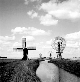 1928 Schöpfmühlen - Kokermühle und Windkraftturbinen an der Neufelder Wettern in der Gemeinde Dammfleth in der Wilstermarsch