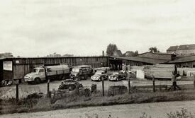 1957 Baustoffhandlung Heinrich Langfeld an der Rumflether Straße in Wilster