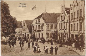 1901 Marktplatz Westseite - 
Tierschau in der Stadt Wilster
