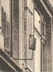 1913 sogen. Fensterspion am Fenster eines Hauses am Kohlmarkt in der Stadt Wilster