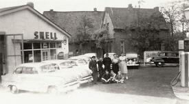 1954 Kraftfahrzeug-Handel, -Werkstadt, Tankstelle, Fahrschule Erich Bauer an der neue Burger Straße in Wilster
