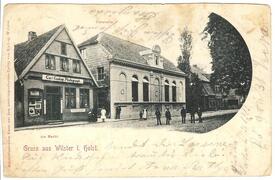 1903 Nordseite des Marktplatzes - Geschäftshaus Kuskop, Turnhalle, Pastorat der Ev.-luth. Kirchengemeinde Wilster